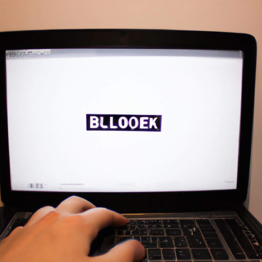 Person using laptop with ad-blocker